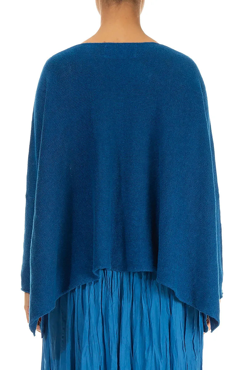 Pull en lin bleu cobalt à larges rayures ondulées